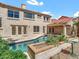 Backyard with a pool, patio, and garden area offering a private and relaxing outdoor space at 11889 N 113Th Pl, Scottsdale, AZ 85259