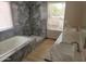 Beautiful bathroom featuring a soaking tub, dual sinks, and an elegant marble-tiled walk-in shower at 11889 N 113Th Pl, Scottsdale, AZ 85259