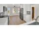 Bright kitchen with stainless steel appliances and eat in kitchen area at 11889 N 113Th Pl, Scottsdale, AZ 85259