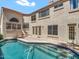 Inviting pool area with pristine water, surrounded by a neutral-colored home and patio area at 11889 N 113Th Pl, Scottsdale, AZ 85259