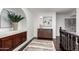 Upstairs hallway with wood floors and accent wall niche at 12853 E Yucca St, Scottsdale, AZ 85259