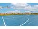 Community basketball court with well-maintained surface and basketball hoops at 13228 W Buckskin Trl, Peoria, AZ 85383