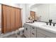 Bathroom with granite vanity, black faucets, and neutral accents at 13228 W Buckskin Trl, Peoria, AZ 85383
