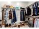 Walk-in closet with organized shelving for clothes, shoes, and accessories at 13228 W Buckskin Trl, Peoria, AZ 85383