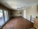 Expansive living room featuring sliding glass doors to an outdoor patio at 1529 W Eva St, Phoenix, AZ 85021