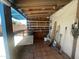 Covered patio space with plenty of room for storage and a table for outdoor dining at 1529 W Eva St, Phoenix, AZ 85021