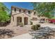 Desirable property showcasing a two-story home with a well-kept front yard and charming curb appeal at 15420 W Canterbury Dr, Surprise, AZ 85379