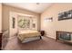 Comfortable bedroom with a large bay window providing plenty of natural light at 1577 E Earl Dr, Casa Grande, AZ 85122