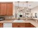 Modern kitchen sink and breakfast bar, offering seamless interaction with the living area at 1577 E Earl Dr, Casa Grande, AZ 85122