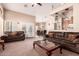 Spacious living room with plush sofas, an open layout, and access to the dining area at 1577 E Earl Dr, Casa Grande, AZ 85122