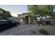 Charming two-story home with a well-manicured front yard and a two-car garage at 16046 W Hearn Rd, Surprise, AZ 85379