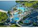 Aerial view of community pools with waterslides, palm trees, clubhouse and lakeside access at 16389 W Fawn Dr, Goodyear, AZ 85338