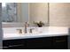 Bathroom sink showcasing clean lines, modern fixtures, and elegant countertop at 16389 W Fawn Dr, Goodyear, AZ 85338