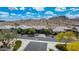 A well-maintained single Gathering home with lush landscaping and desert views at 16389 W Fawn Dr, Goodyear, AZ 85338