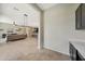 Open floor plan showcases seamless transitions between living areas and kitchen at 16389 W Fawn Dr, Goodyear, AZ 85338