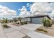 Street view features a single-Gathering home with desert landscaping and a private two-car garage at 17376 W Via De Luna Dr, Surprise, AZ 85387