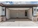 Empty two car garage with water heater at 17376 W Via De Luna Dr, Surprise, AZ 85387