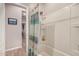 This bathroom features a shower/tub combination and a modern shower curtain at 17419 W Georgia Dr, Surprise, AZ 85388