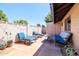Inviting back patio with comfortable seating, string lights, and a private outdoor space at 17802 N 45Th Ave, Glendale, AZ 85308