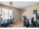 Bright bedroom features light wood floors and a ceiling fan at 17802 N 45Th Ave, Glendale, AZ 85308