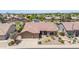 Aerial view of a well-maintained home with a tile roof and desert landscaping at 17836 N 52Nd Pl, Scottsdale, AZ 85254