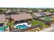 A backyard oasis features a pool and spa, with ample green space and a covered patio for outdoor living and entertaining at 17836 N 52Nd Pl, Scottsdale, AZ 85254