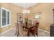 Cozy dining room featuring a chandelier and space for entertaining at 17836 N 52Nd Pl, Scottsdale, AZ 85254