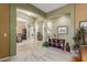 Spacious foyer showcasing the home's open layout with tile flooring and neutral paint at 17836 N 52Nd Pl, Scottsdale, AZ 85254