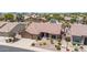 Beautiful single-Gathering home with a desert landscaped front yard, three car garage and tile roof at 17836 N 52Nd Pl, Scottsdale, AZ 85254