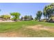Scenic green space with mature trees and lush landscaping, great for recreation at 17836 N 52Nd Pl, Scottsdale, AZ 85254
