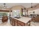 The kitchen flows seamlessly into the dining area and the cozy living room, creating a warm and inviting atmosphere at 17836 N 52Nd Pl, Scottsdale, AZ 85254