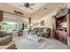 Inviting living room with vaulted ceilings, ample natural light, and views of the pool at 17836 N 52Nd Pl, Scottsdale, AZ 85254