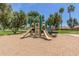 Community playground featuring slides and play structures, all surrounded by trees at 17836 N 52Nd Pl, Scottsdale, AZ 85254
