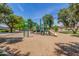 Brightly colored community playground featuring climbing structures and a slide at 17836 N 52Nd Pl, Scottsdale, AZ 85254