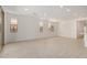 Large living area featuring neutral walls, light tile flooring, recessed lighting, and large windows at 18210 W Hess St, Goodyear, AZ 85338
