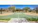 Well-maintained community basketball court, surrounded by beautiful landscaping at 18515 N 97Th Way, Scottsdale, AZ 85255