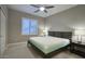 Serene bedroom featuring modern bed frame, plantation shutters, and plush carpeting at 18515 N 97Th Way, Scottsdale, AZ 85255