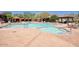 Resort-style pool and hot tub with plenty of seating for residents to enjoy the outdoors at 18515 N 97Th Way, Scottsdale, AZ 85255