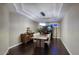 Elegant dining room with tray ceilings, contemporary lighting, and stylish decor at 18515 N 97Th Way, Scottsdale, AZ 85255