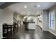 Spacious kitchen seamlessly connects to dining area with modern appliances and island seating at 18515 N 97Th Way, Scottsdale, AZ 85255