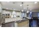 Modern, spacious kitchen with stainless steel appliances, island, and ample cabinet space at 18515 N 97Th Way, Scottsdale, AZ 85255