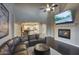 Inviting living area with vaulted ceiling, fireplace and seamless access to modern kitchen at 18515 N 97Th Way, Scottsdale, AZ 85255