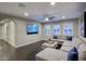 Inviting living room with large windows, modern furniture, and dark hardwood floors at 18515 N 97Th Way, Scottsdale, AZ 85255