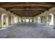 Open air pavilion with brick flooring, wood beam ceiling, and multiple arched doorways at 18515 N 97Th Way, Scottsdale, AZ 85255
