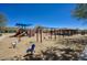 Community playground featuring swings, slides, and rocking animals in a Gathering-friendly setting at 18515 N 97Th Way, Scottsdale, AZ 85255