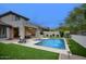 Inviting backyard pool area with manicured landscaping and outdoor seating at 18515 N 97Th Way, Scottsdale, AZ 85255