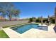 Beautiful backyard pool featuring a square design with desert landscaping at 18515 N 97Th Way, Scottsdale, AZ 85255