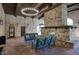 Resident lounge with stone fireplace and comfortable seating at 18515 N 97Th Way, Scottsdale, AZ 85255