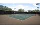 An outdoor tennis court on a sunny day at 18515 N 97Th Way, Scottsdale, AZ 85255