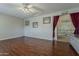 Bonus room with wood floors and a view into the upstairs loft area at 18581 E Aubrey Glen Rd, Queen Creek, AZ 85142